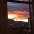 Sunset over mountains from living room.